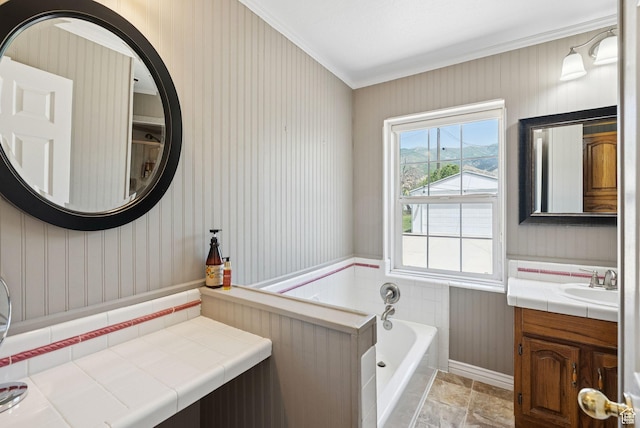 145 S 300 E, Kaysville, UT 84037 - full bath with a garden tub, vanity, ornamental molding, wallpapered walls, and wainscoting