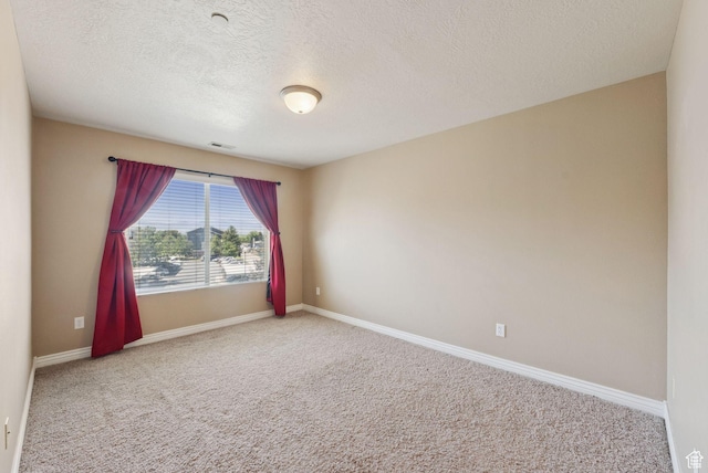 8229 S Resaca Dr Unit D11, Sandy, UT 84070 - unfurnished room with carpet and a textured ceiling