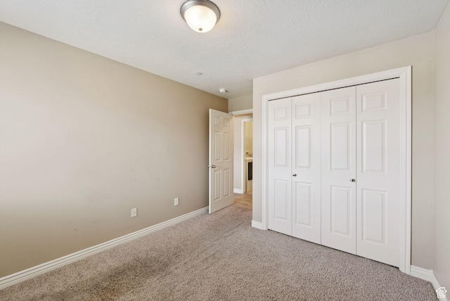 8229 S Resaca Dr Unit D11, Sandy, UT 84070 - unfurnished bedroom featuring carpet flooring and a closet