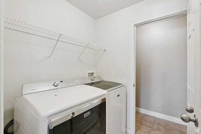 8229 S Resaca Dr Unit D11, Sandy, UT 84070 - laundry area with washing machine and clothes dryer and baseboards