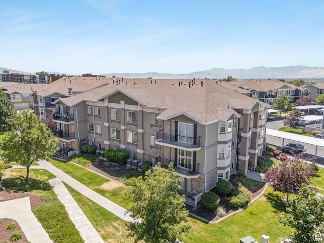 8229 S Resaca Dr Unit D11, Sandy, UT 84070 - aerial perspective of suburban area featuring a mountain backdrop