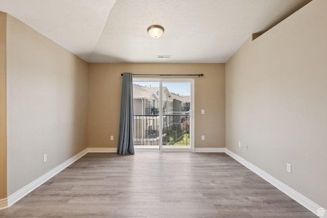 8229 S Resaca Dr Unit D11, Sandy, UT 84070 - empty room with wood finished floors