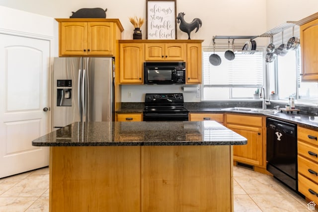 2343 E 1580 S, Spanish Fork, UT 84660 - kitchen featuring black appliances, a kitchen island, light tile patterned flooring, and dark stone countertops