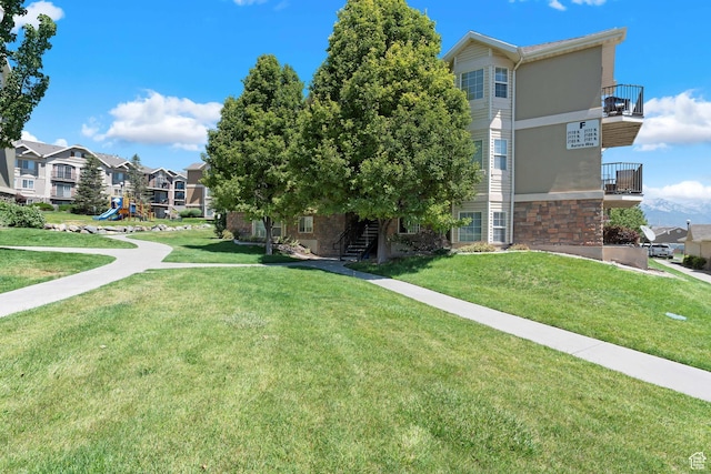 2103 N Aurora Way, Saratoga Springs, UT 84045 - view of property's community with a yard, stairs, and a residential view