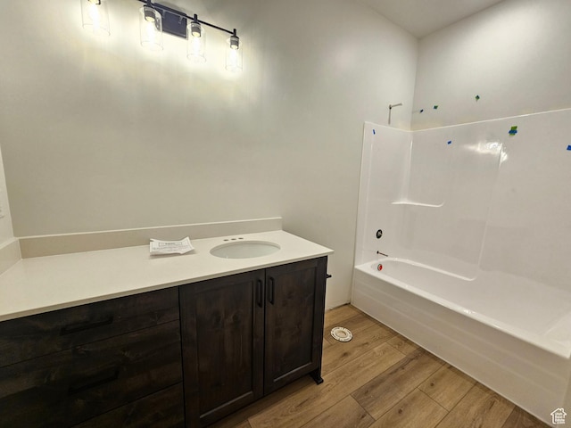 1768 S 3875 W Unit 227, Taylor, UT 84401 - full bathroom with wood finished floors, bathing tub / shower combination, and vanity