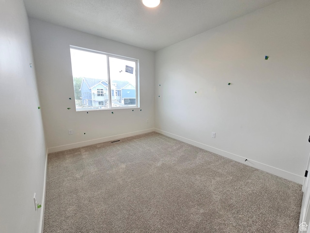 1768 S 3875 W Unit 227, Taylor, UT 84401 - empty room with baseboards and light colored carpet