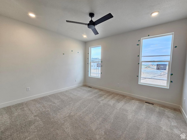 1768 S 3875 W Unit 227, Taylor, UT 84401 - empty room featuring a ceiling fan, light colored carpet, recessed lighting, and a textured ceiling