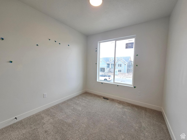 1768 S 3875 W Unit 227, Taylor, UT 84401 - empty room with light colored carpet