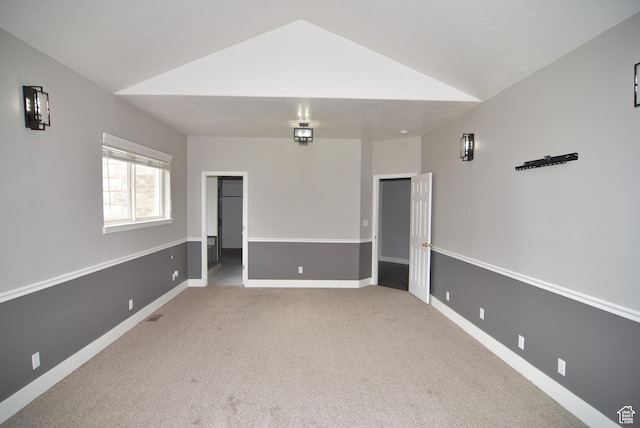 107 W High Sierra Dr, Elk Ridge, UT 84651 - carpeted spare room with vaulted ceiling and baseboards