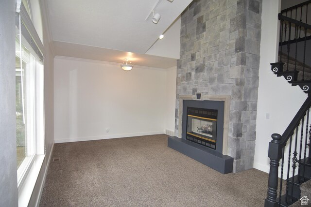 107 W High Sierra Dr, Elk Ridge, UT 84651 - unfurnished living room featuring stairway, carpet flooring, healthy amount of natural light, and ornamental molding