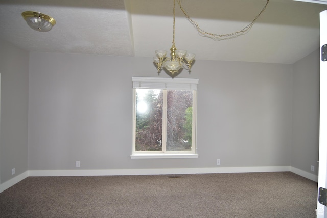 107 W High Sierra Dr, Elk Ridge, UT 84651 - spare room with a chandelier, carpet flooring, and vaulted ceiling