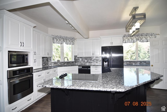 107 W High Sierra Dr, Elk Ridge, UT 84651 - kitchen featuring black appliances, backsplash, dark wood-style floors, and white cabinetry