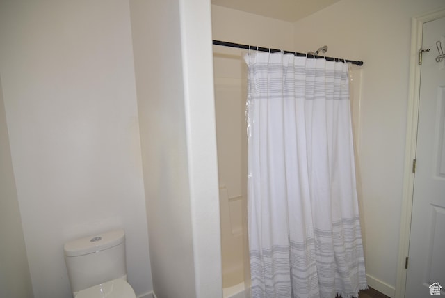 107 W High Sierra Dr, Elk Ridge, UT 84651 - bathroom featuring toilet and shower / bath combo with shower curtain