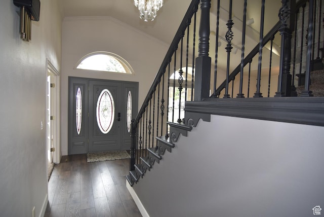 107 W High Sierra Dr, Elk Ridge, UT 84651 - foyer featuring a chandelier, stairway, wood finished floors, high vaulted ceiling, and ornamental molding