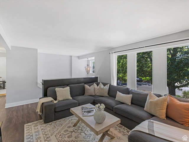 9457 S Poppy Ln, Sandy, UT 84094 - living area featuring wood finished floors and a chandelier