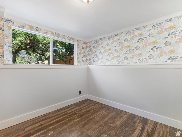 9457 S Poppy Ln, Sandy, UT 84094 - spare room featuring dark wood-style floors and a wainscoted wall
