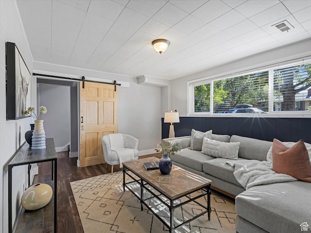 9457 S Poppy Ln, Sandy, UT 84094 - living area featuring a barn door and wood finished floors