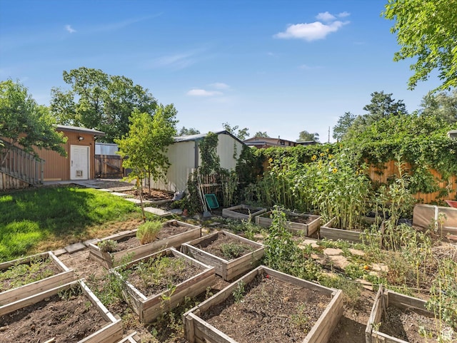 9457 S Poppy Ln, Sandy, UT 84094 - fenced backyard with a vegetable garden and a storage shed