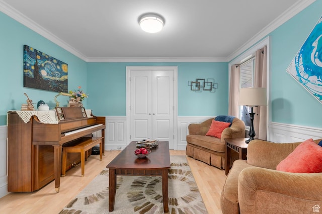 3558 S Chippewa Rd, West Valley City, UT 84120 - living area featuring light wood finished floors, a wainscoted wall, and crown molding