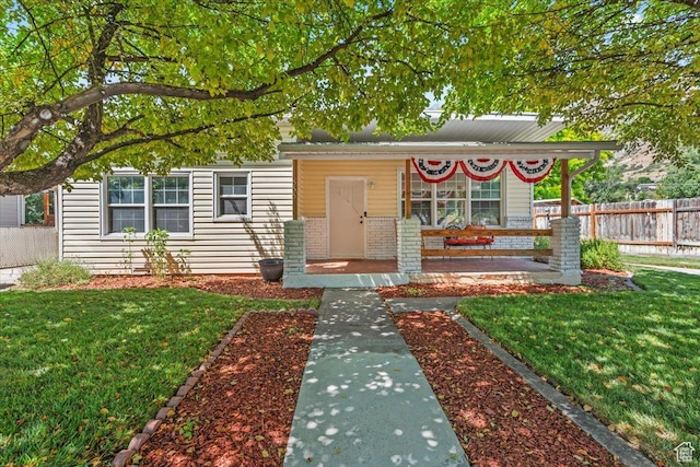 555 E 400 N, Springville, UT 84663 - view of front facade featuring a porch and brick siding