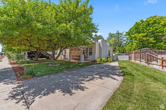 555 E 400 N, Springville, UT 84663 - view of front of property featuring covered porch, driveway, and a chimney