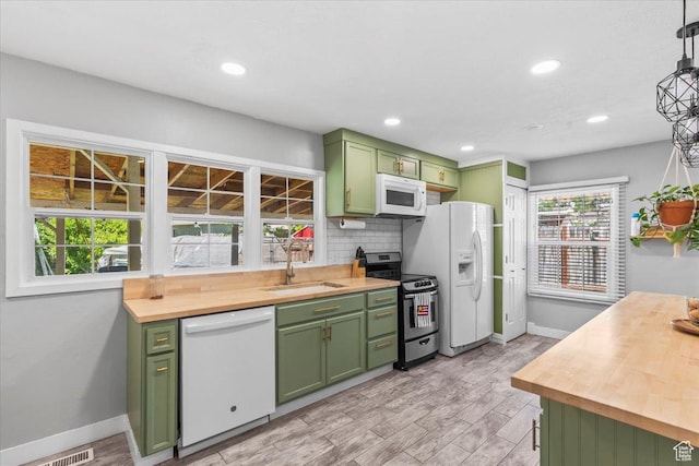 555 E 400 N, Springville, UT 84663 - kitchen with green cabinets, white appliances, wood counters, tasteful backsplash, and recessed lighting
