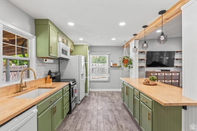 555 E 400 N, Springville, UT 84663 - kitchen with green cabinets, white appliances, butcher block counters, wood finished floors, and recessed lighting