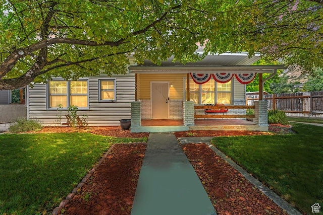 555 E 400 N, Springville, UT 84663 - view of front of house featuring a porch and brick siding