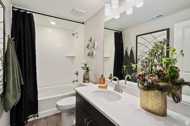 6181 W Franciscotti Dr Unit 521, South Jordan, UT 84009 - full bathroom featuring wood finished floors, vanity, and shower / bath combo