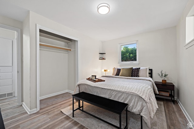 251 E 1500 S, Orem, UT 84058 - bedroom featuring wood finished floors and a closet