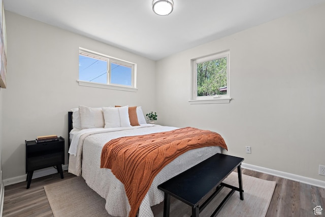 251 E 1500 S, Orem, UT 84058 - bedroom with multiple windows and wood finished floors