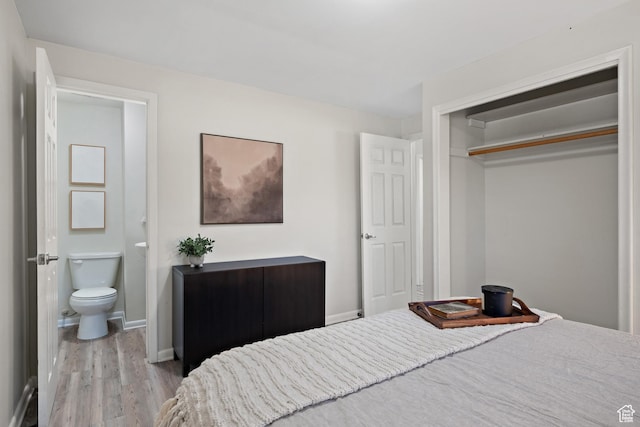 251 E 1500 S, Orem, UT 84058 - bedroom with wood finished floors, a closet, and ensuite bathroom