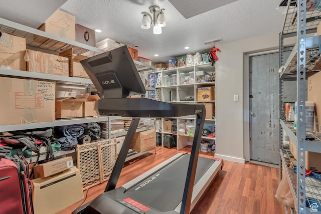 10768 N Fiddlesticks Lot 30, Cedar Hills, UT 84062 - workout room with wood finished floors and a textured ceiling