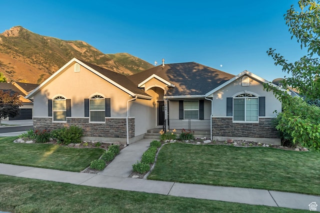 10768 N Fiddlesticks Lot 30, Cedar Hills, UT 84062 - ranch-style home featuring stucco siding, stone siding, a front lawn, and a mountain view