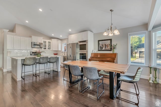 10768 N Fiddlesticks Lot 30, Cedar Hills, UT 84062 - dining space featuring vaulted ceiling, dark wood-type flooring, recessed lighting, and a chandelier