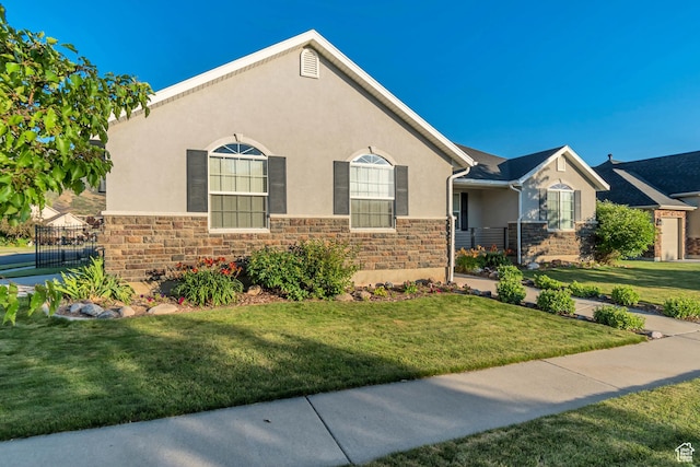 10768 N Fiddlesticks Lot 30, Cedar Hills, UT 84062 - view of front facade with stone siding, stucco siding, and a front lawn
