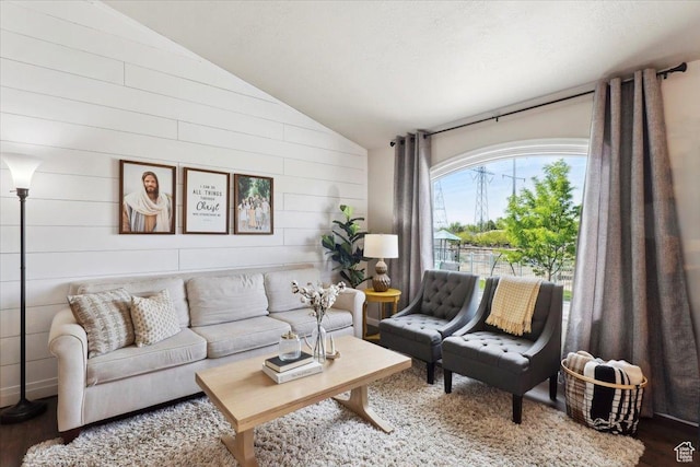 1184 Bridgecreek Ln, Layton, UT 84041 - living area featuring vaulted ceiling, wood finished floors, and wood walls