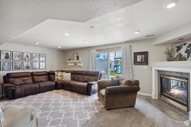 1184 Bridgecreek Ln, Layton, UT 84041 - living room featuring a textured ceiling, a tile fireplace, and recessed lighting