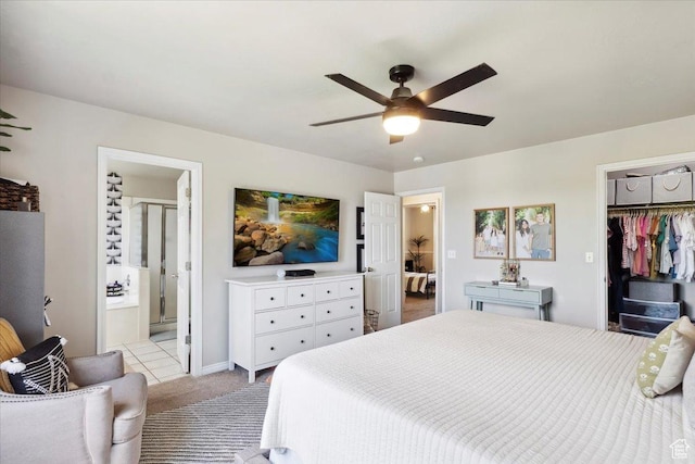 1184 Bridgecreek Ln, Layton, UT 84041 - bedroom featuring light colored carpet, ensuite bathroom, a spacious closet, and a ceiling fan