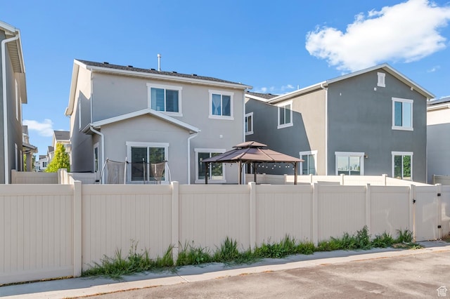 5631 W Still Well Ln S, Herriman, UT 84096 - rear view of property featuring a gazebo and stucco siding