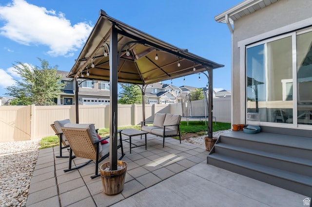 5631 W Still Well Ln S, Herriman, UT 84096 - fenced backyard featuring a trampoline, a patio area, and a gazebo