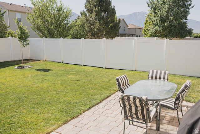 279 S 950 W, Spanish Fork, UT 84660 - fenced backyard with a mountain view, a patio area, and outdoor dining area