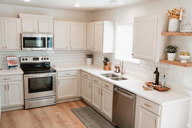279 S 950 W, Spanish Fork, UT 84660 - kitchen featuring appliances with stainless steel finishes, open shelves, tasteful backsplash, and white cabinets