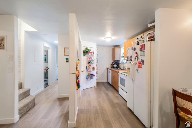 249 N 800 W, Orem, UT 84057 - kitchen featuring white appliances, light wood-style floors, and light countertops