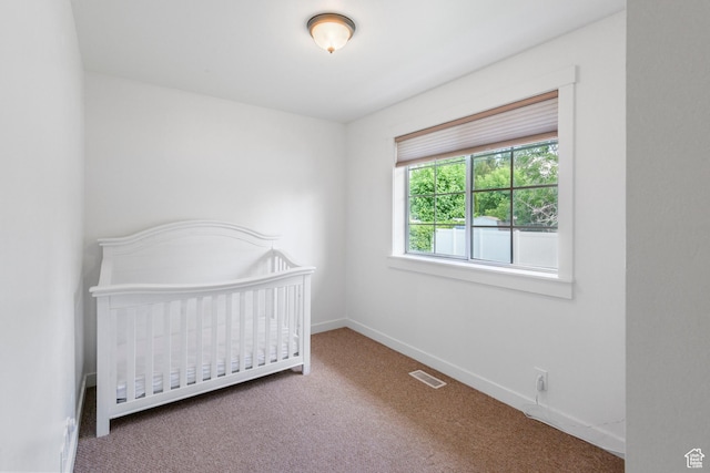 249 N 800 W, Orem, UT 84057 - unfurnished bedroom featuring carpet flooring and a nursery area