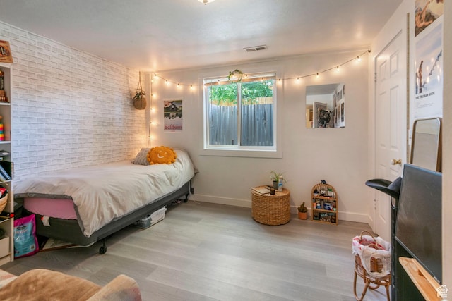 249 N 800 W, Orem, UT 84057 - bedroom with wood finished floors and brick wall