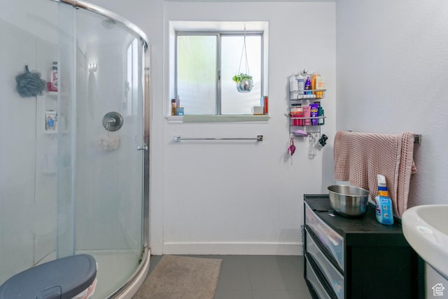 249 N 800 W, Orem, UT 84057 - bathroom with a stall shower, tile patterned floors, and vanity