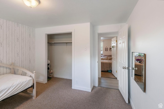 249 N 800 W, Orem, UT 84057 - carpeted bedroom featuring a closet and wood walls