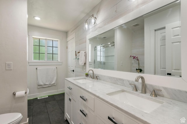 249 N 800 W, Orem, UT 84057 - bathroom with double vanity, tile patterned flooring, and a stall shower