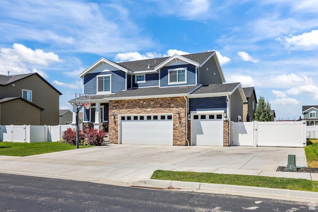 1098 S 4050 W, Syracuse, UT 84075 - craftsman house with a gate, driveway, stone siding, and an attached garage